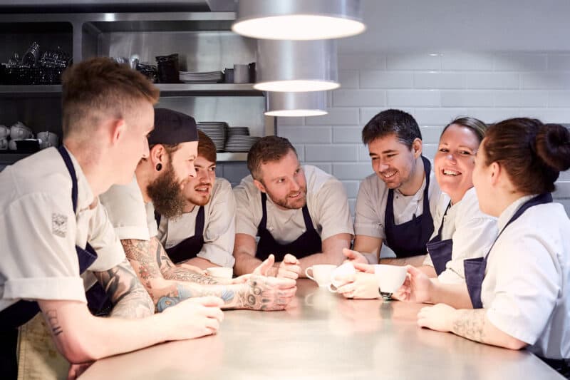 chefs in the kitchen meeting
