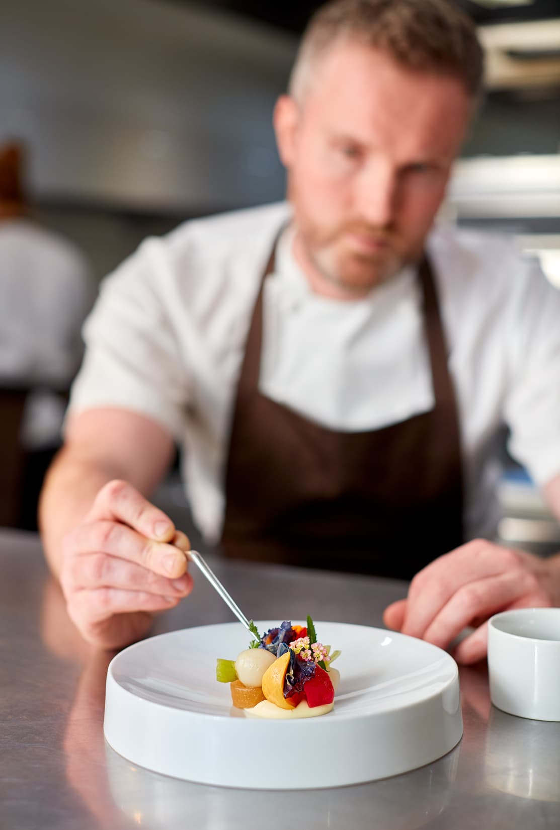 chef decorating dessert
