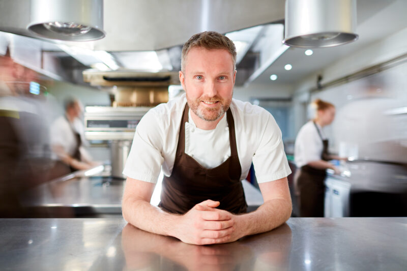 smiling chef in the kitchen