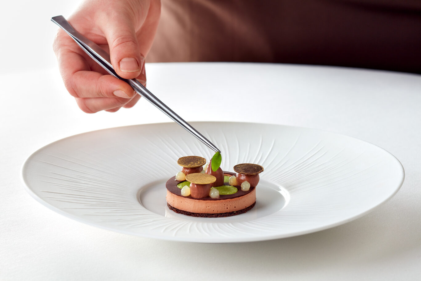 chef decorating exotic food