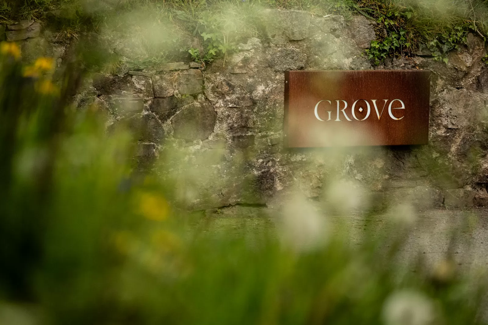 A Grove sign at Spring time